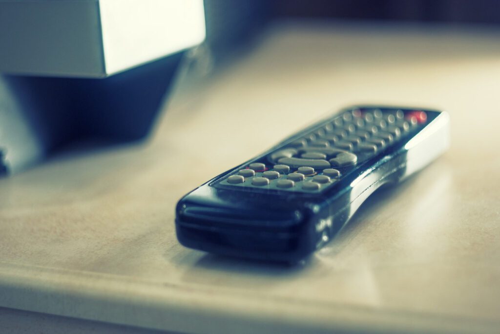 Image of a remote control on a flat surface.