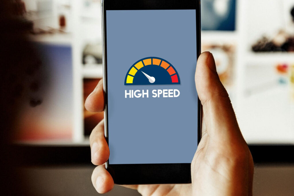 A phone screen shows an internet speed test with the text “High Speed” on the screen.