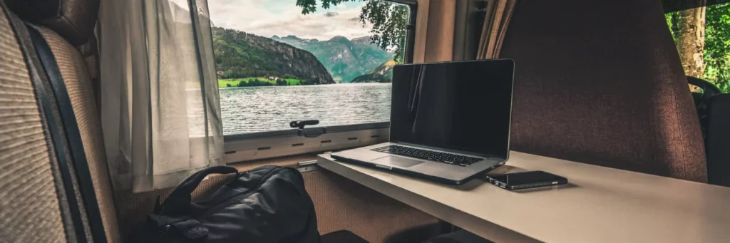 watching TV (on laptop or phone) in RV or in front of RV